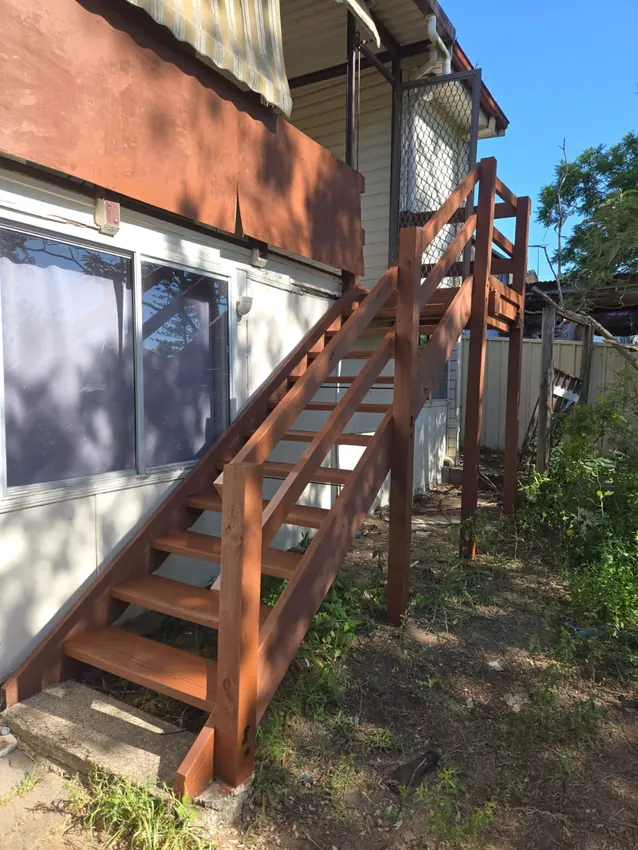 A rebuilt timber staircase at the rear of a Guildford home.