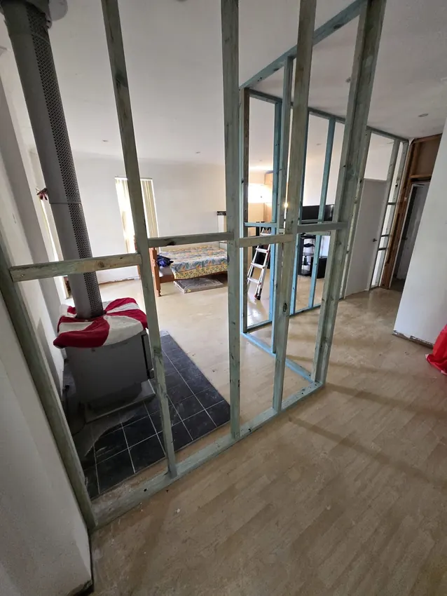 New internal stud walls being framed inside a Liverpool home.