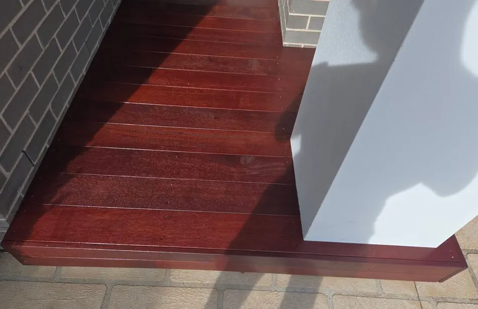 Timber Deck Corner & Step Build: new timber decking corner and step section, stained to finish