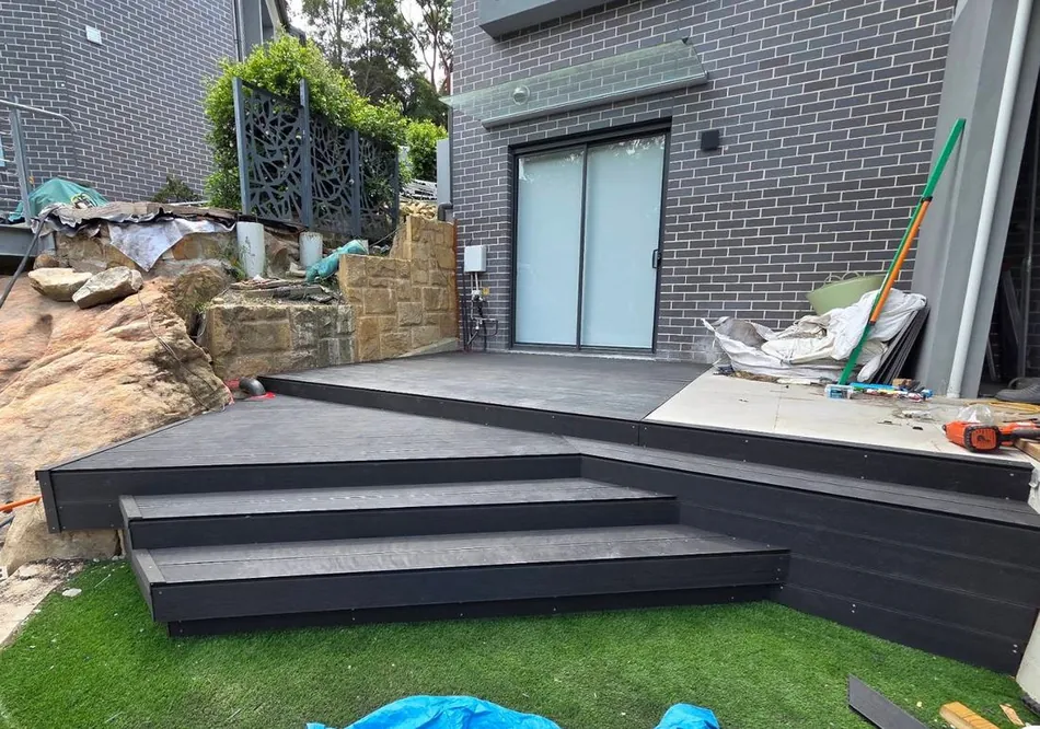 Backyard after excavation and composite deck build