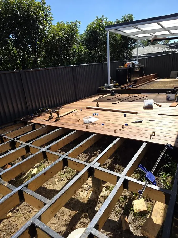 Deck framing mid-construction in Bella Vista.