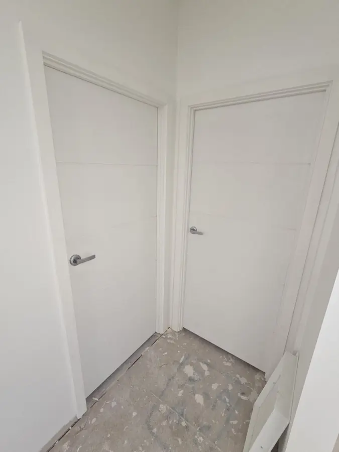 New Internal Doors: flush panel doors hung and trimmed, ready for flooring